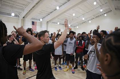 Bobby leading a group of players through shooting form