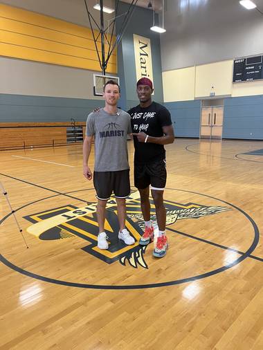 Bobby Perez with Isaiah Miller